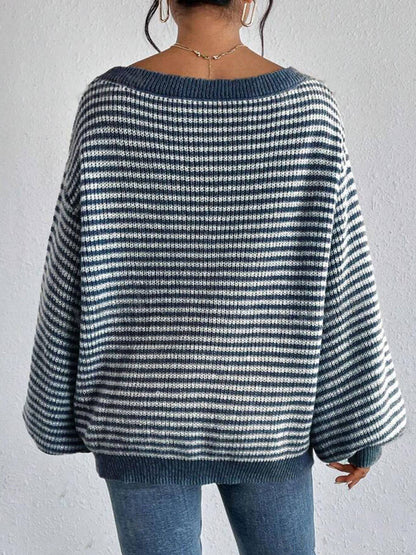 Cozy colorblocked striped one-shoulder knit sweater with relaxed fit and soft fabric. Wear off-shoulder or boat neck. Perfect for fall layering with denim or skirts.