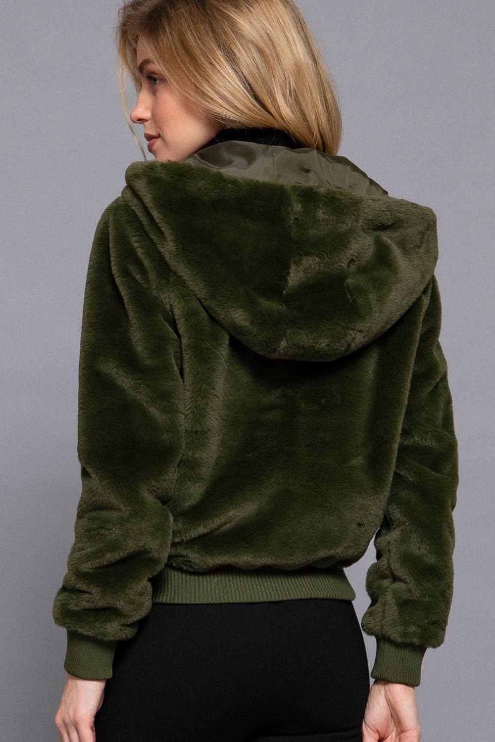 Faux fur zip-up hoodie fall jacket made from 100% polyester. Soft, plush, and cozy with a hood and pockets—perfect for layering in autumn and winter.