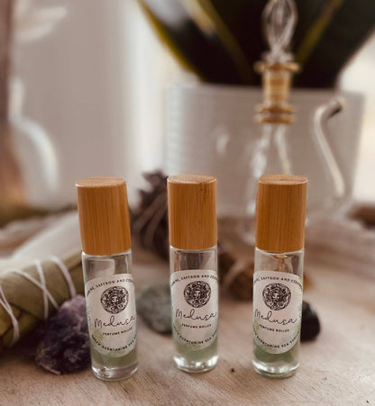 Unleash your inner goddess with Medusa Perfume Roller—jasmine, saffron, and cedarwood infused with aventurine and sea shells for oceanic allure.
