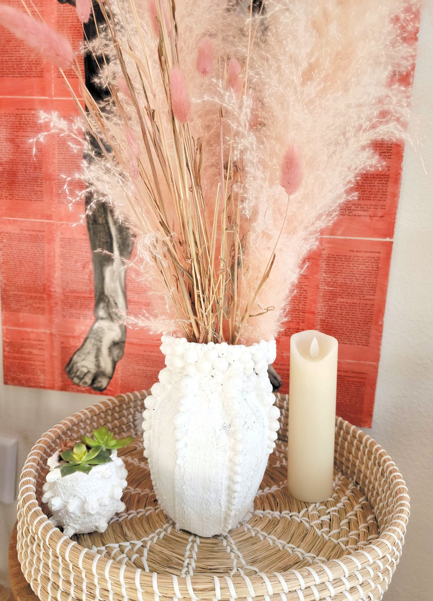 Elevate your decor with this handcrafted upcycled glass urn-shaped vase, made from reclaimed materials for a sustainable touch. Available in Glossy Black or Matte White, each unique piece offers artistic flair and eco-friendly style. Perfect for fresh or dried flowers, it suits both indoor and covered outdoor spaces.
