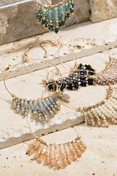 Shimmering beaded tassel chandelier earrings with a lightweight metal ring, hypoallergenic fish hooks, and dazzling glass beads—perfect for any occasion! 