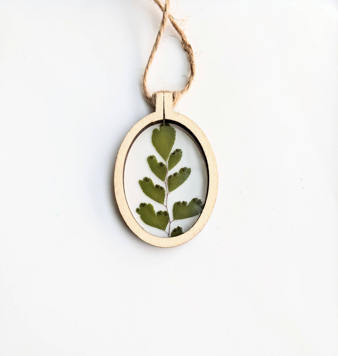 Handcrafted wood frame ornaments with real pressed flowers or leaves. Unique, nature-inspired décor perfect for holiday trees, gifts, or year-round charm.